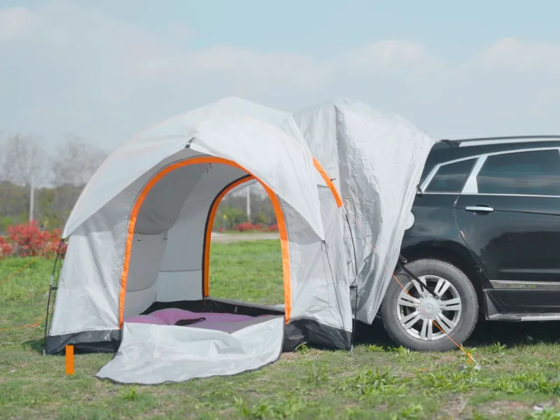 Vevor SUV tent attached with sleeve to a black SUV