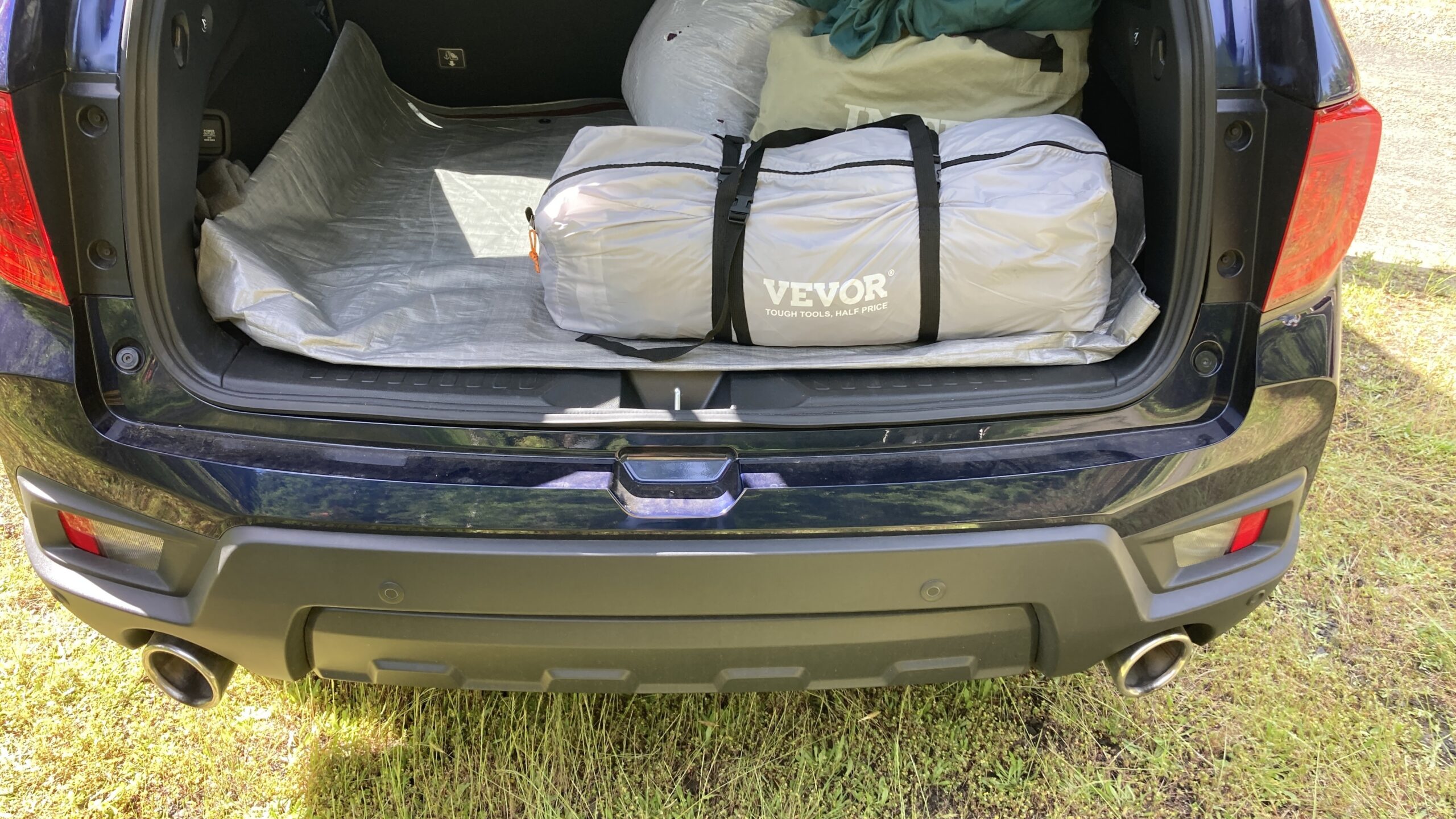 The tent packed in its Vevor carry bag in the back of the Passport